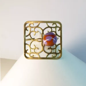 Sujeta-pañuelos Lunares Morados